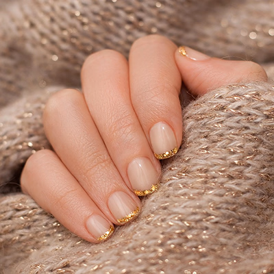 Trendy nail art on well-manicured hand