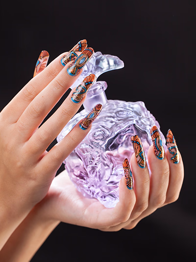Colorful abstract acrylic nail art with extra-long coffin nails