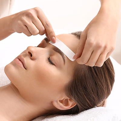 Professional hot wax hair removal service at the spa